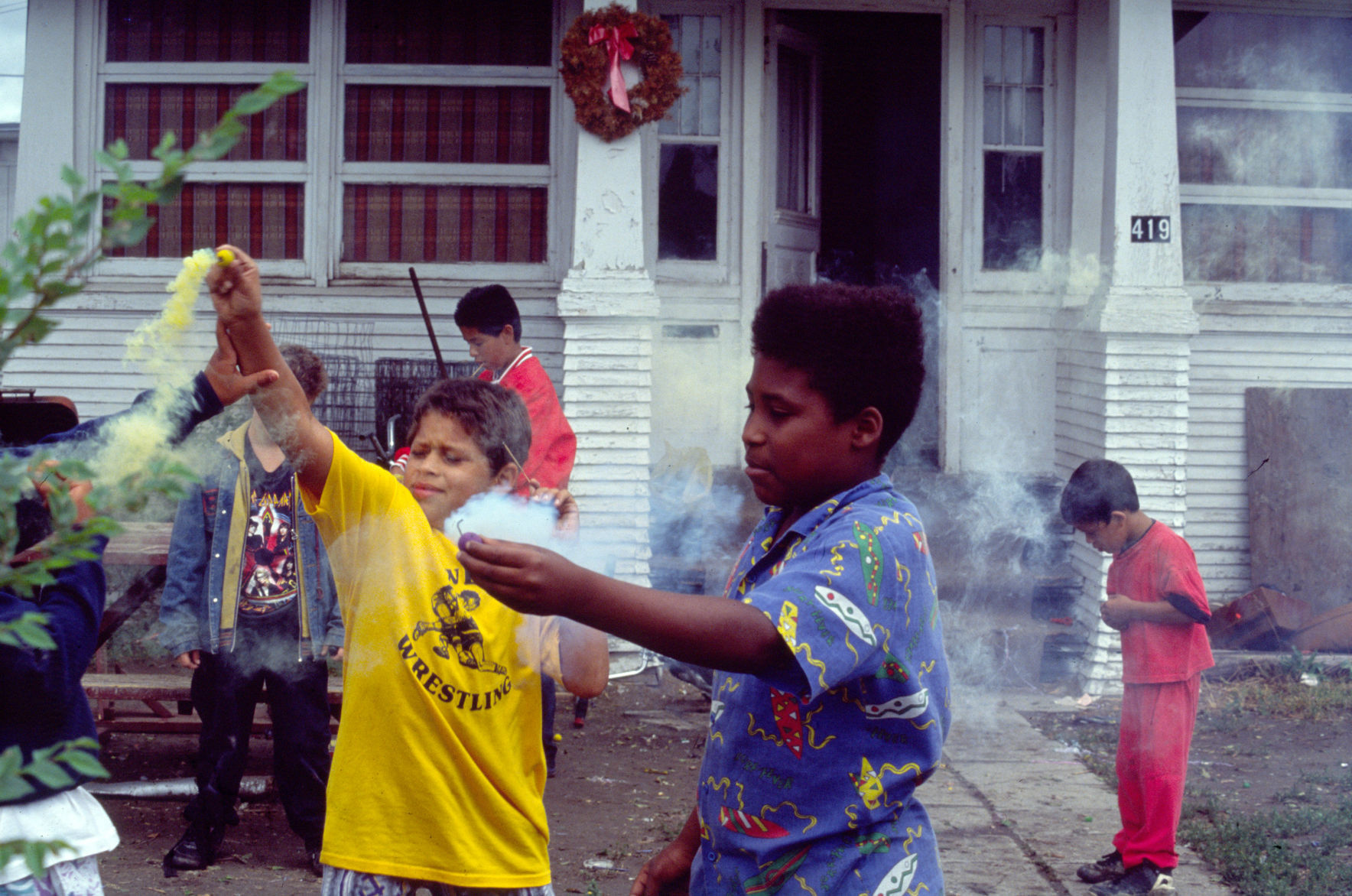 Kids playing with fireworks, June 1992